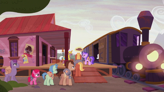 Distressed ponies boarding the train S5E25.png