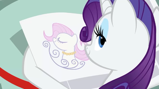 Rarity looking at a news ad S2E23.png