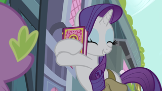 Rarity hugging the book S4E23.png