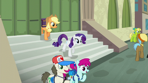Applejack and Rarity exit the train station S5E16.png