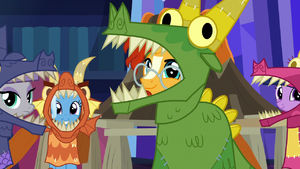 Maud, Trixie, Sunburst, and Twilight in dragon costumes S7E24.png