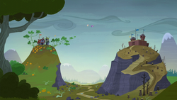 Twilight and Fluttershy hovering between two hills S5E23.png