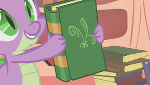 Spike showing Twilight a book S1E09.png