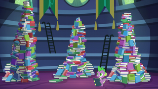 Spike standing besides the mountains of books S5E22.png