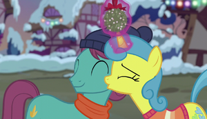 Lemon Hearts kissing a stallion's cheek S6E8.png