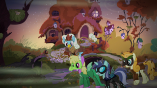 Ponies in costumes outside Fluttershy's cottage S5E21.png