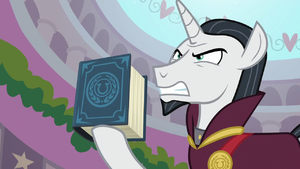 Neighsay holding the EEA guidebook S8E26.png