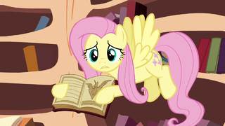 Fluttershy trying to get her friends to see the book S3E05.png