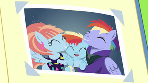 Close-up on photo of Bow and Windy hugging Baby Rainbow S7E7.png