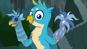 Gallus holding puppets of himself and tree S9E3.png