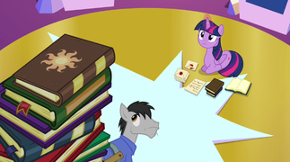 Book with Celestia's cutie mark on top of book pile EG2.png