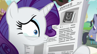 Rarity tearing up behind the newspaper S7E14.png