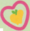 带粉红心形轮廓的黄苹果