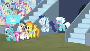 The Wonderbolts enter the stadium S4E24.png